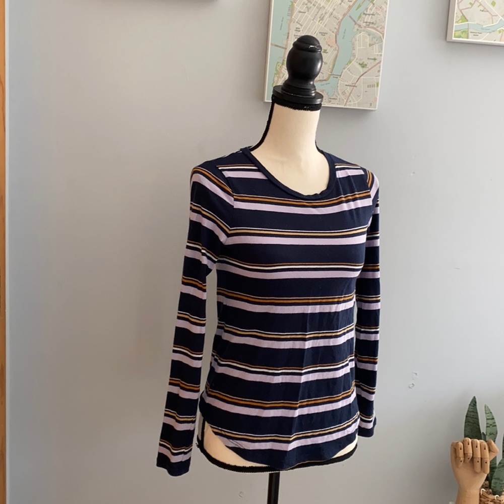 A striped colored soft, stretchable, never worn long sleeve t-shirt